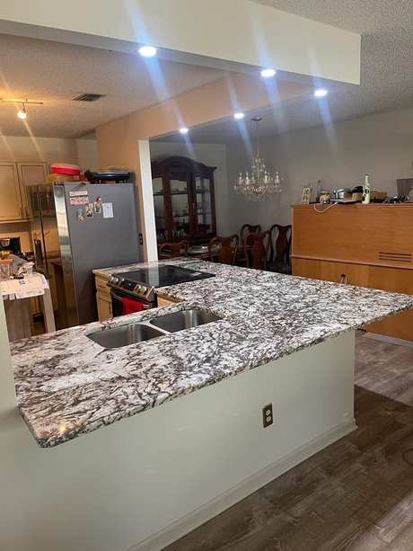 Black and white granite kitchen island