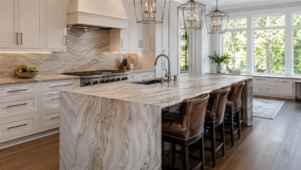Kitchen island with waterfall edge countertop